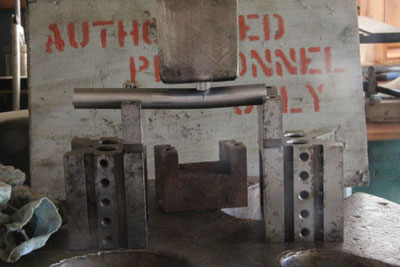 Bending one of the Zundapp KS601 solo seat frame tubes.