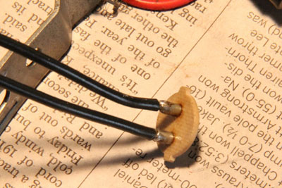 Contacts in place with wires soldered.